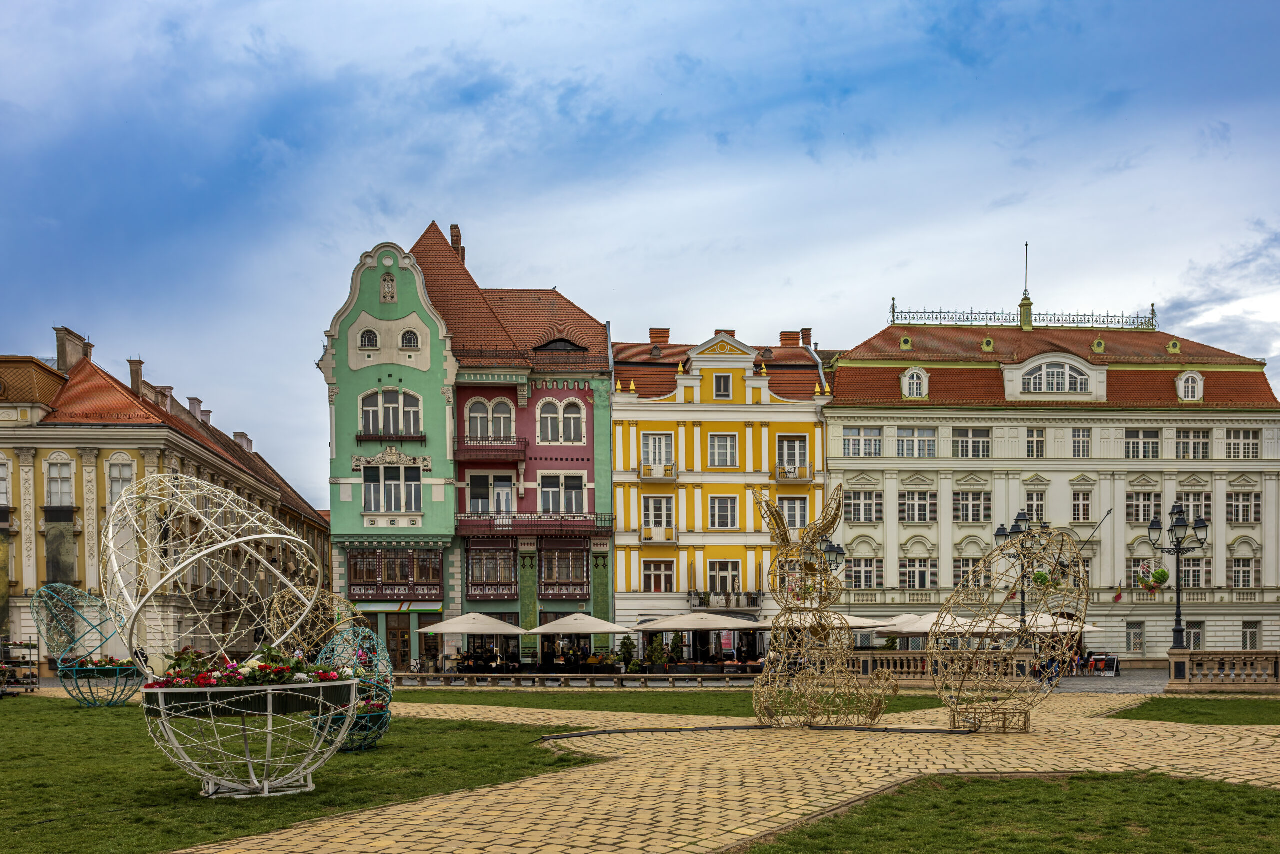 Timisoara's Union Square scenery with the surrounding baroque-style buildings in preparation for the Eastern festival. Photo taken on the 22nd of March 2025 in Timisoara, the European Cultural Capital of 2023, Timis County, Romania.